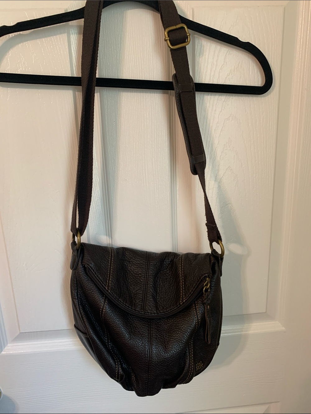 The Sak Deena brown fold over crossbody bag